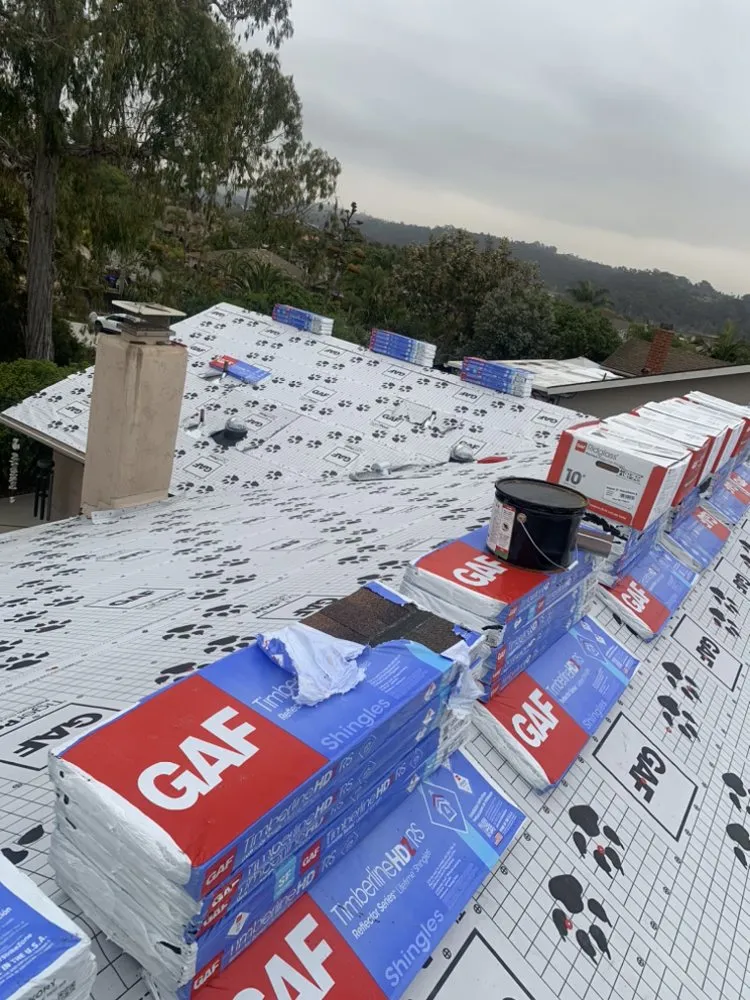 Slide of Aqua MG Roofing and Painting