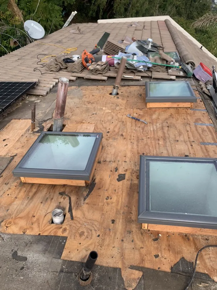 Slide of Aqua MG Roofing and Painting