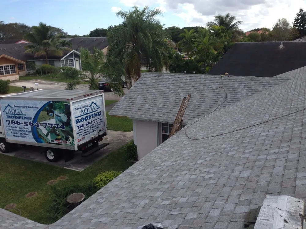 Slide of Aqua Roofing