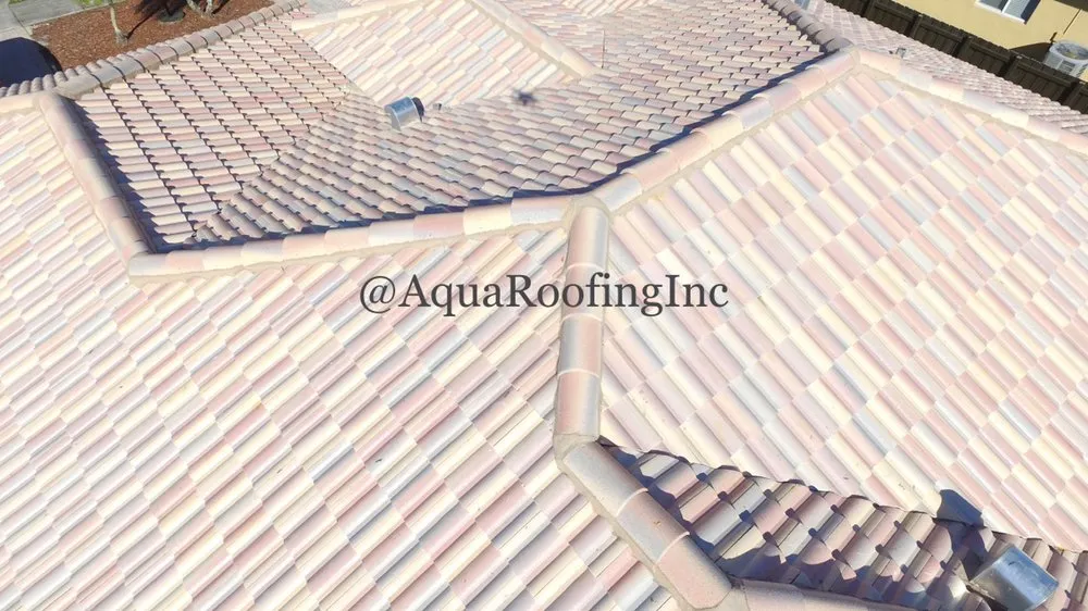 Slide of Aqua Roofing