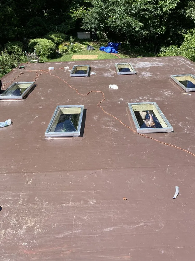 Slide of AquaGuard Roofing Services