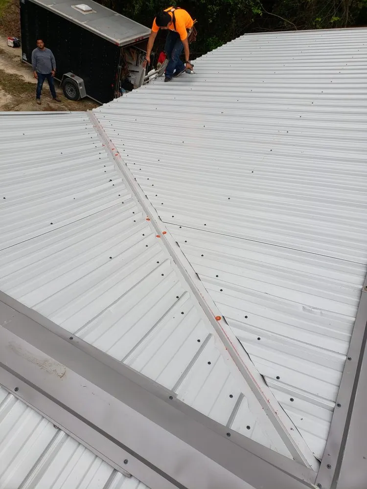 Slide of AR Roofing and Remodeling