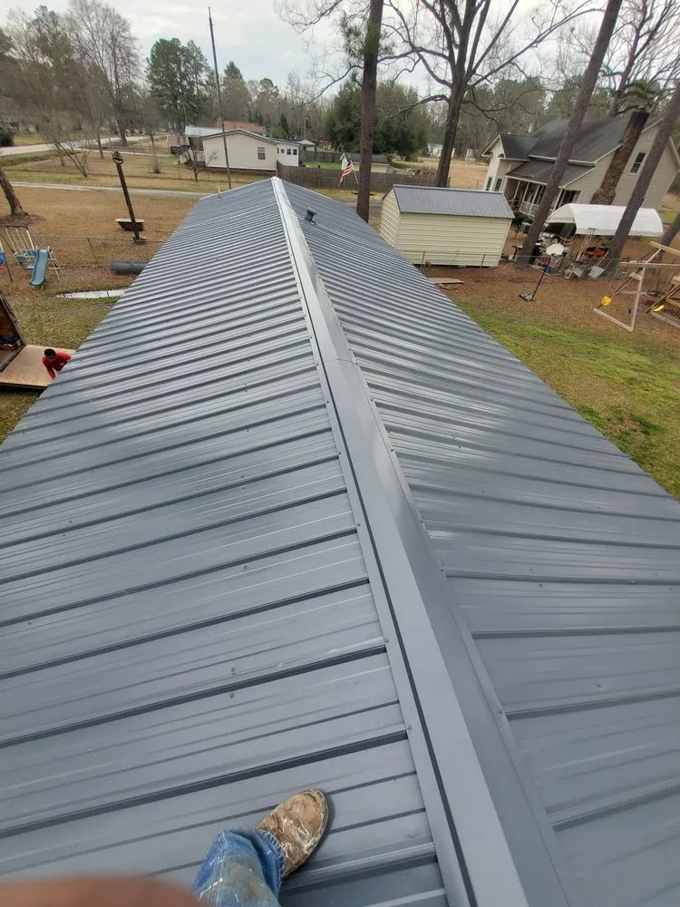 Slide of AR Roofing and Remodeling