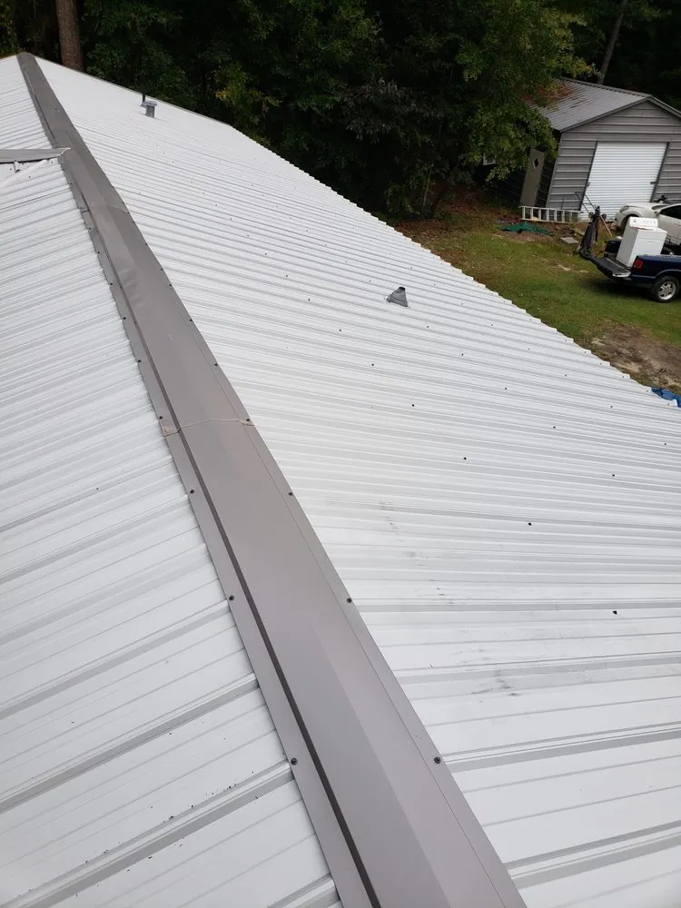 Slide of AR Roofing and Remodeling