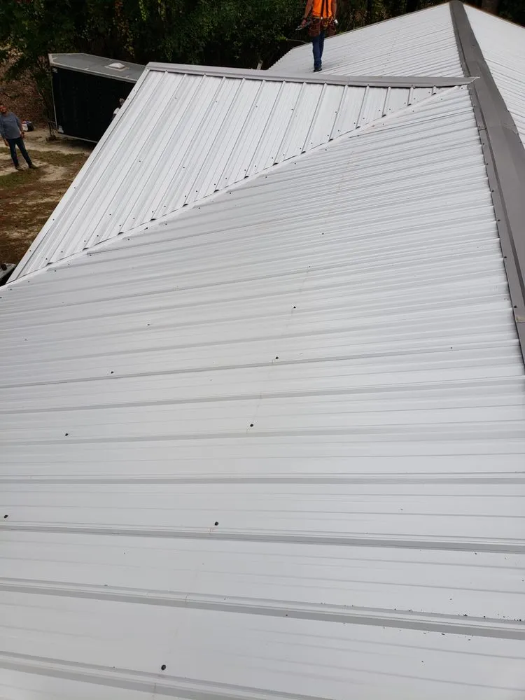 Slide of AR Roofing and Remodeling