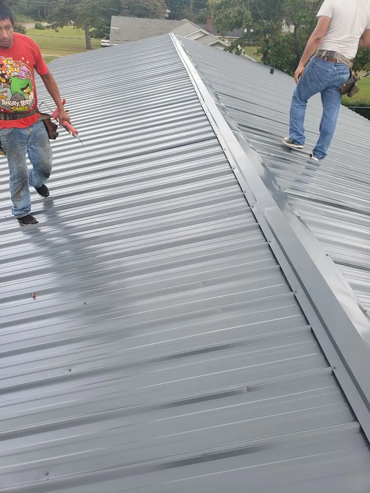 Slide of AR Roofing and Remodeling