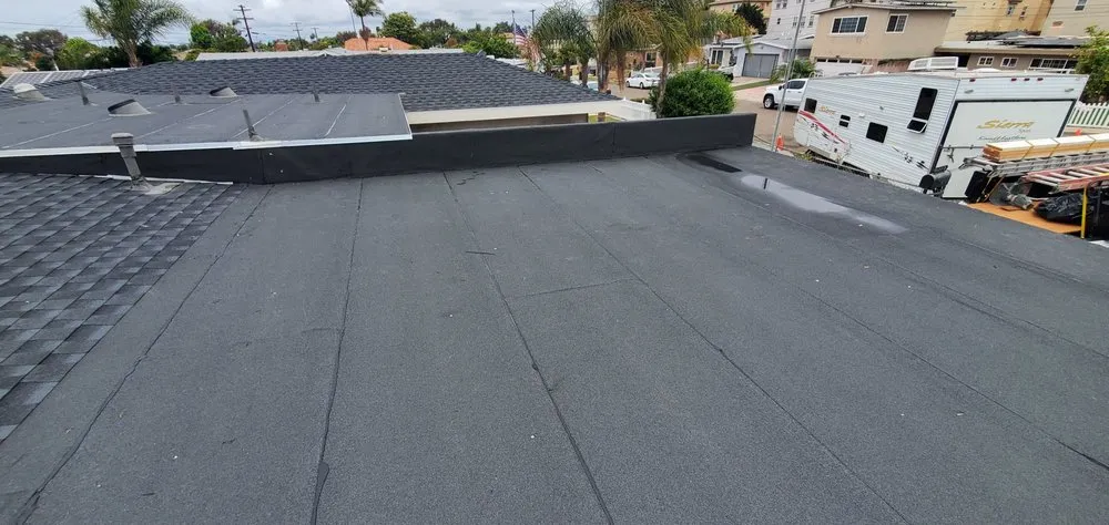 Slide of Araujo Roofing