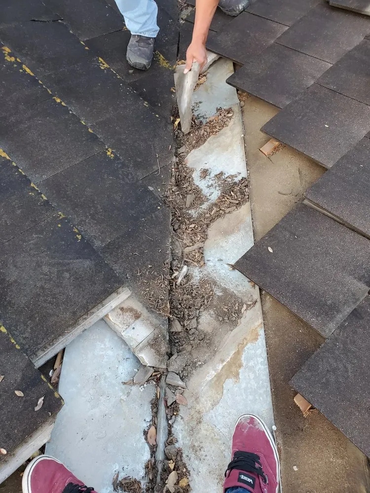 Slide of Arbiter Roofing