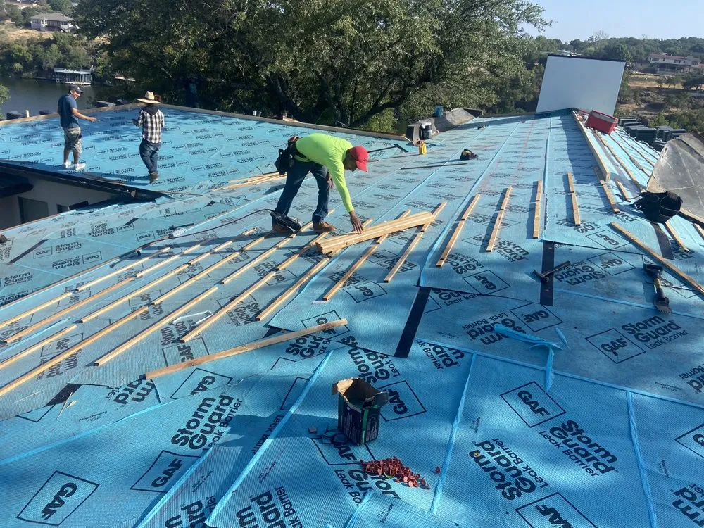 Slide of Arbiter Roofing