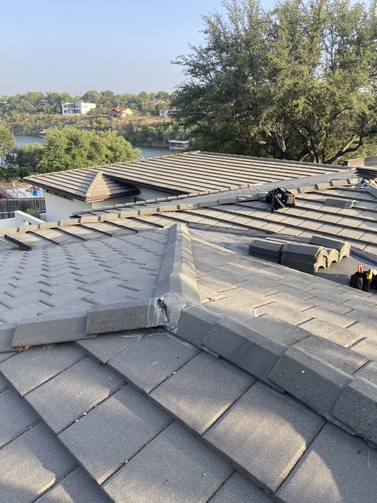 Slide of Arbiter Roofing