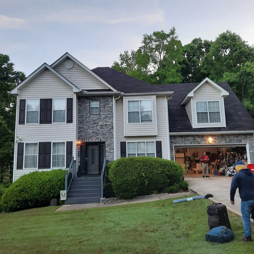 Slide of Arbra Roofing