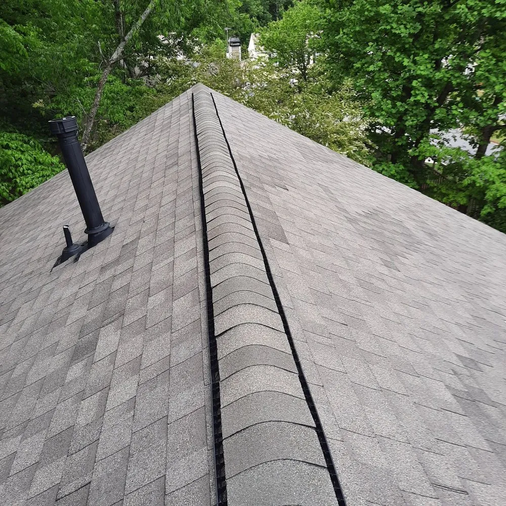 Slide of Arbra Roofing