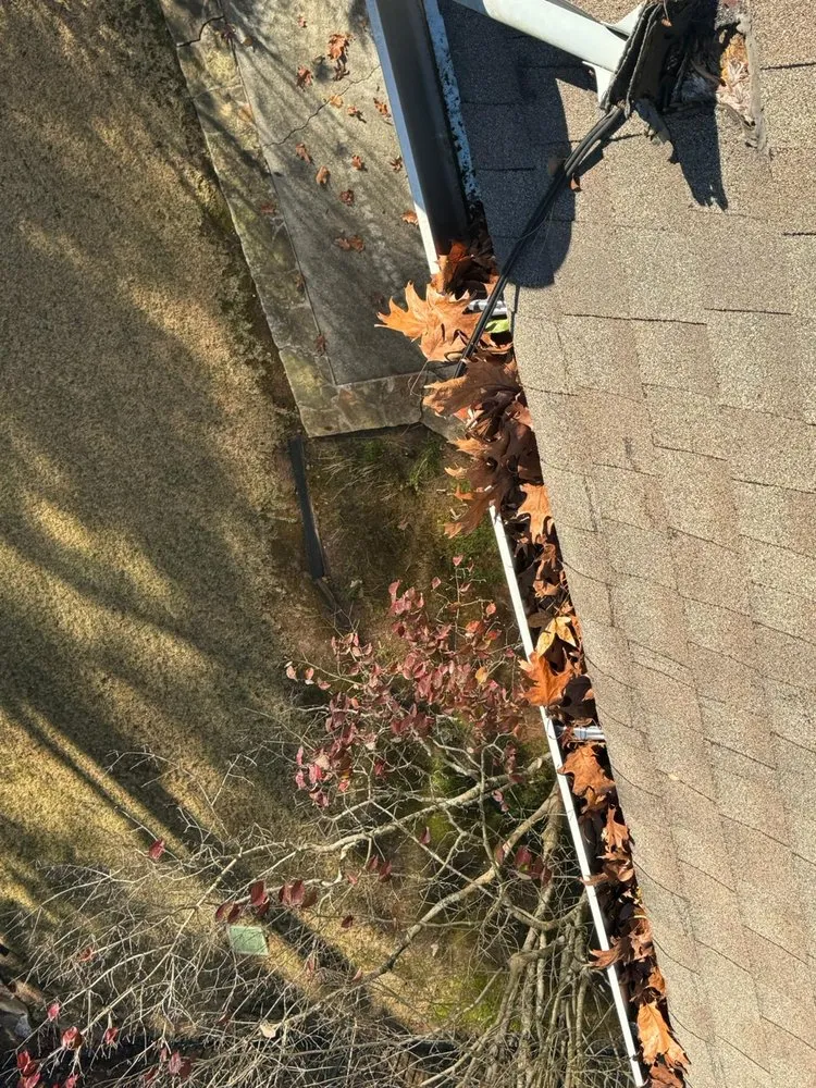 Slide of Arc Gutter Cleaning