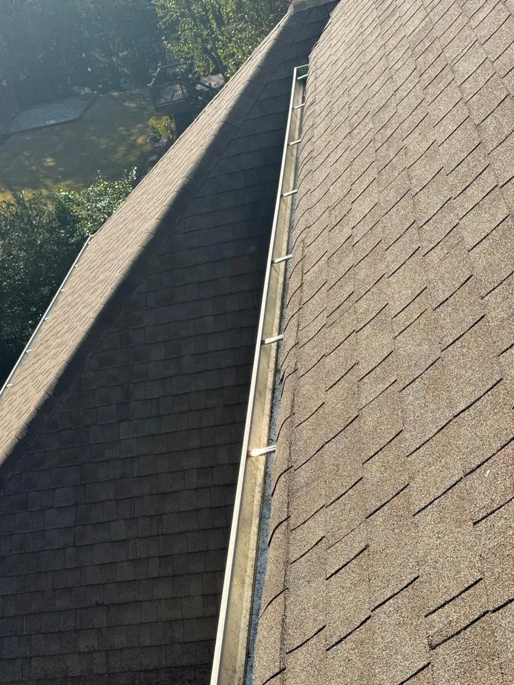 Slide of Arc Gutter Cleaning