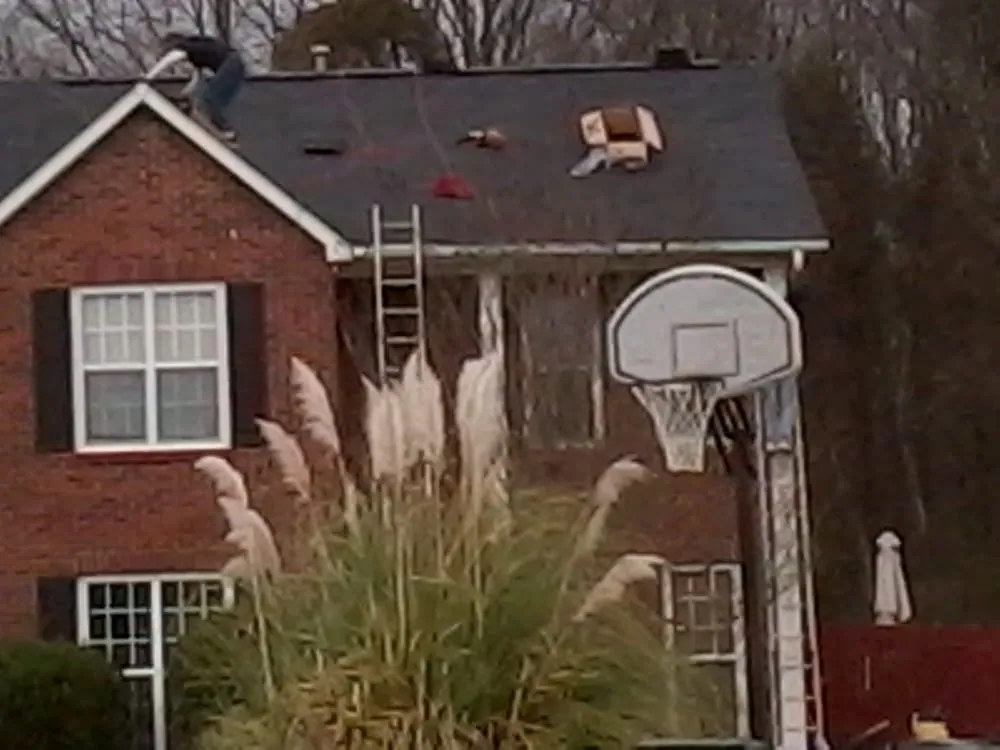 Slide of ARC Roofing and Construction