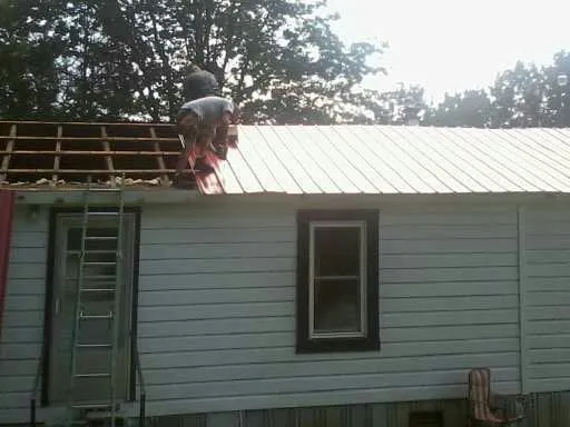 Slide of ARC Roofing and Construction