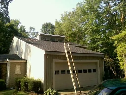 Slide of ARC Roofing and Construction