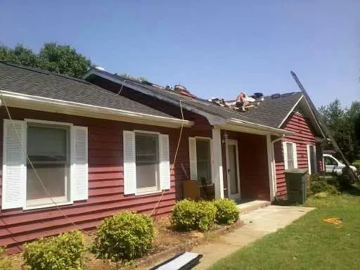 Slide of ARC Roofing and Construction