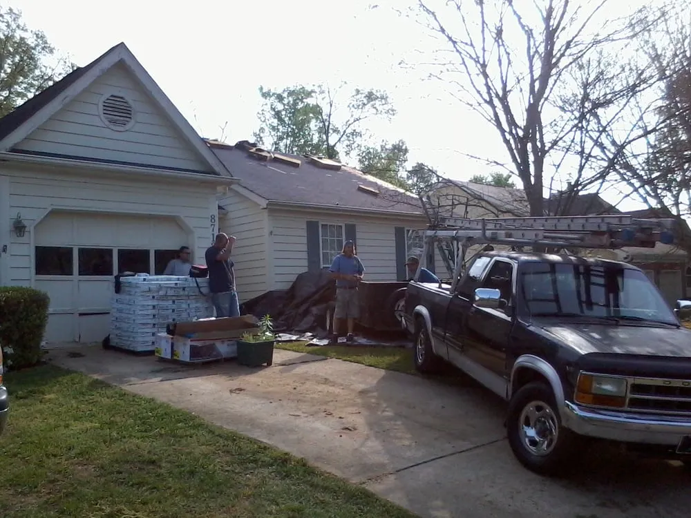 Slide of ARC Roofing and Construction