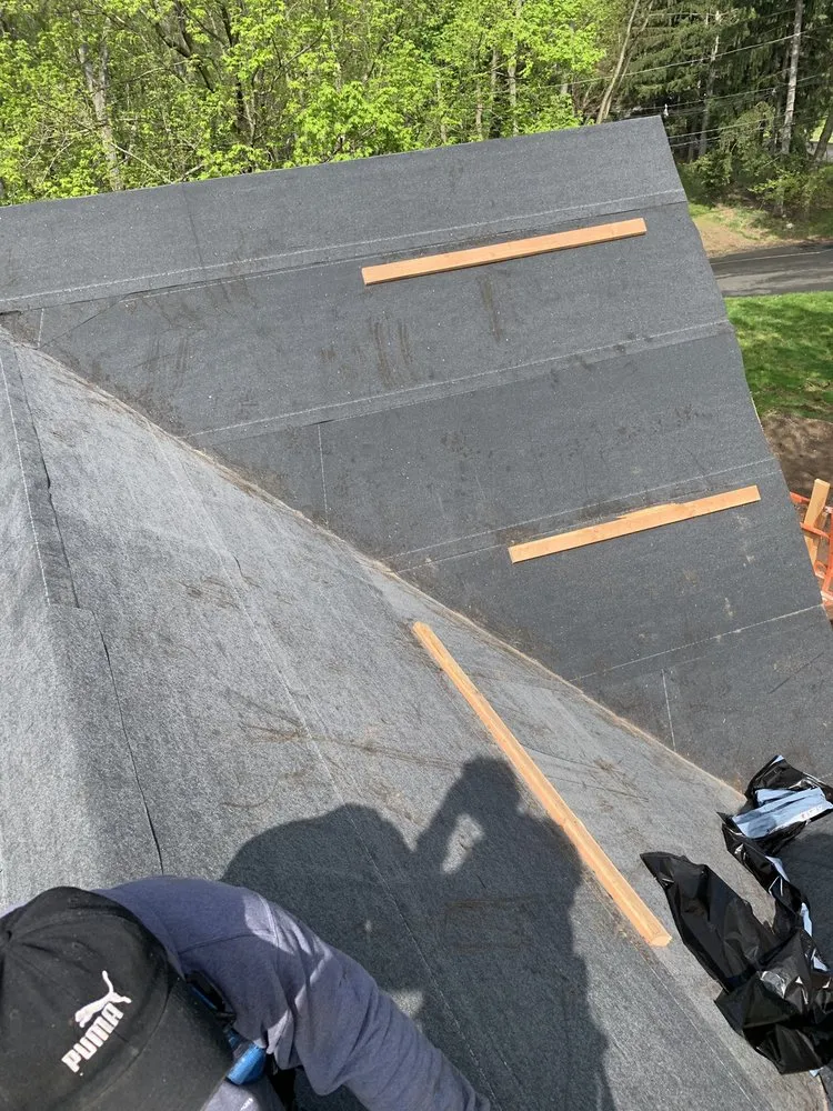 Slide of Arcade Roofing & Home Improvement