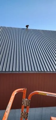 Arcade Roofing & Home Improvement Logo