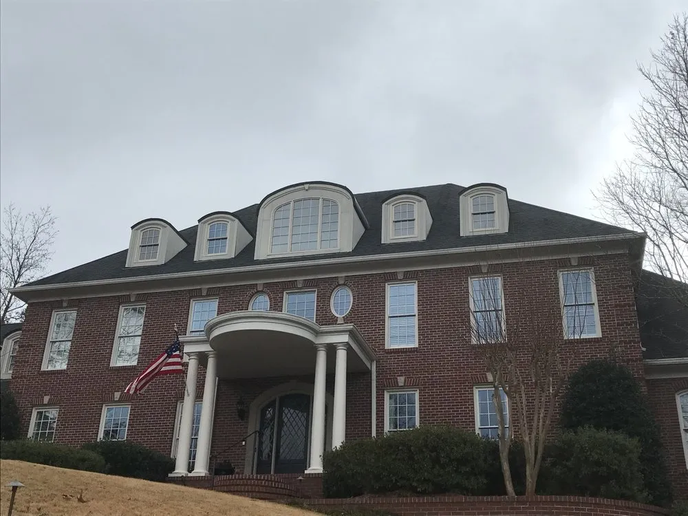 Slide of ArcCon Roofing Company