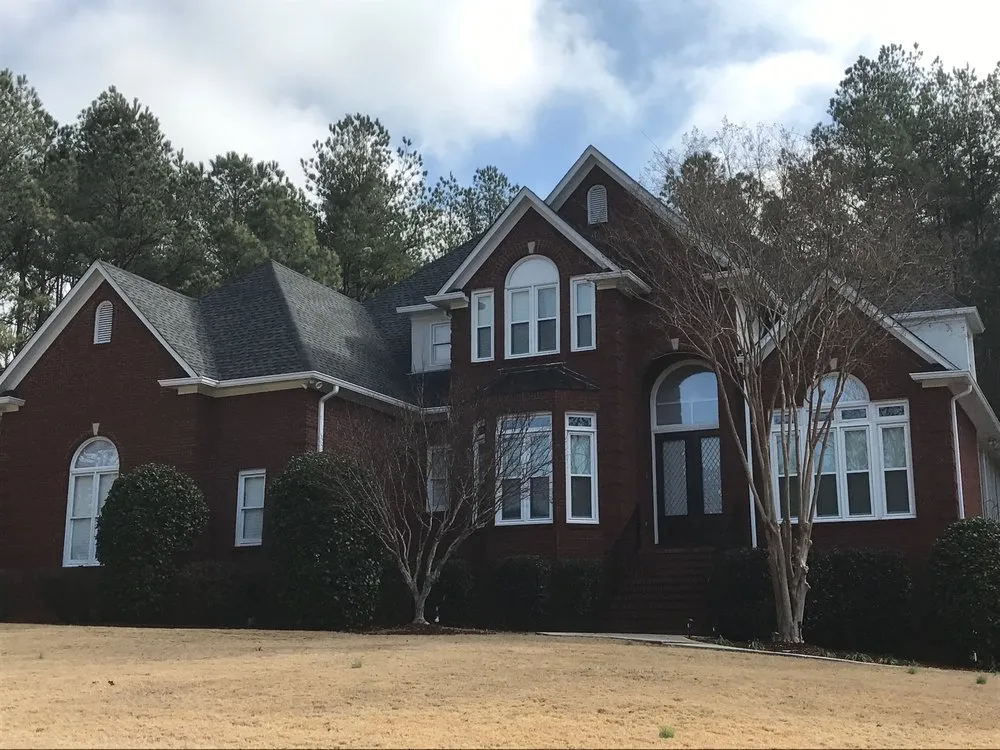 Slide of ArcCon Roofing Company