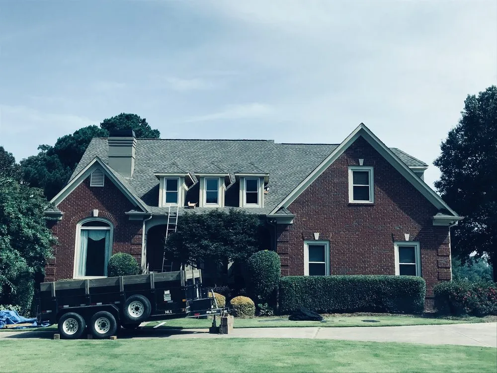 Slide of ArcCon Roofing Company