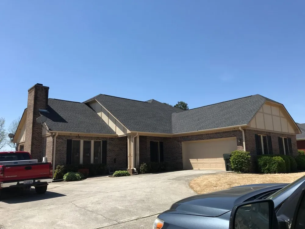 Slide of ArcCon Roofing Company