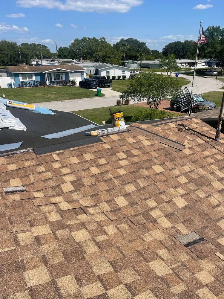 Slide of Arch Roofing & Repair