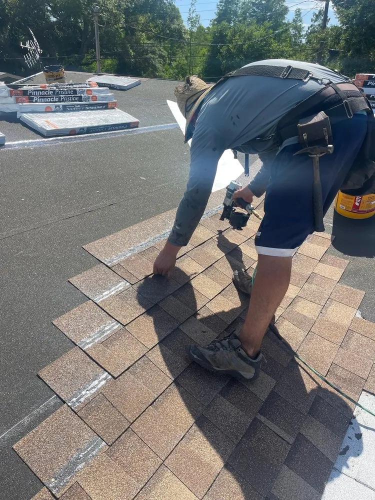 Slide of Arch Roofing & Repair