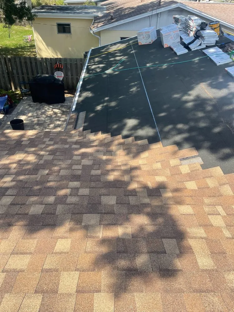 Slide of Arch Roofing & Repair