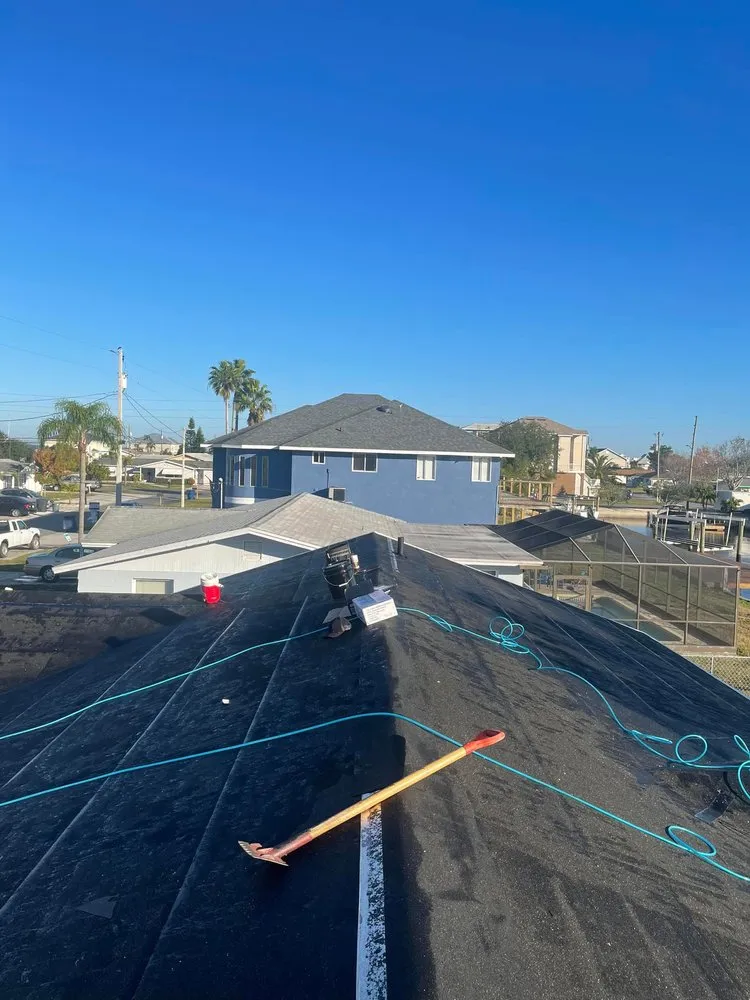 Slide of Arch Roofing & Repair