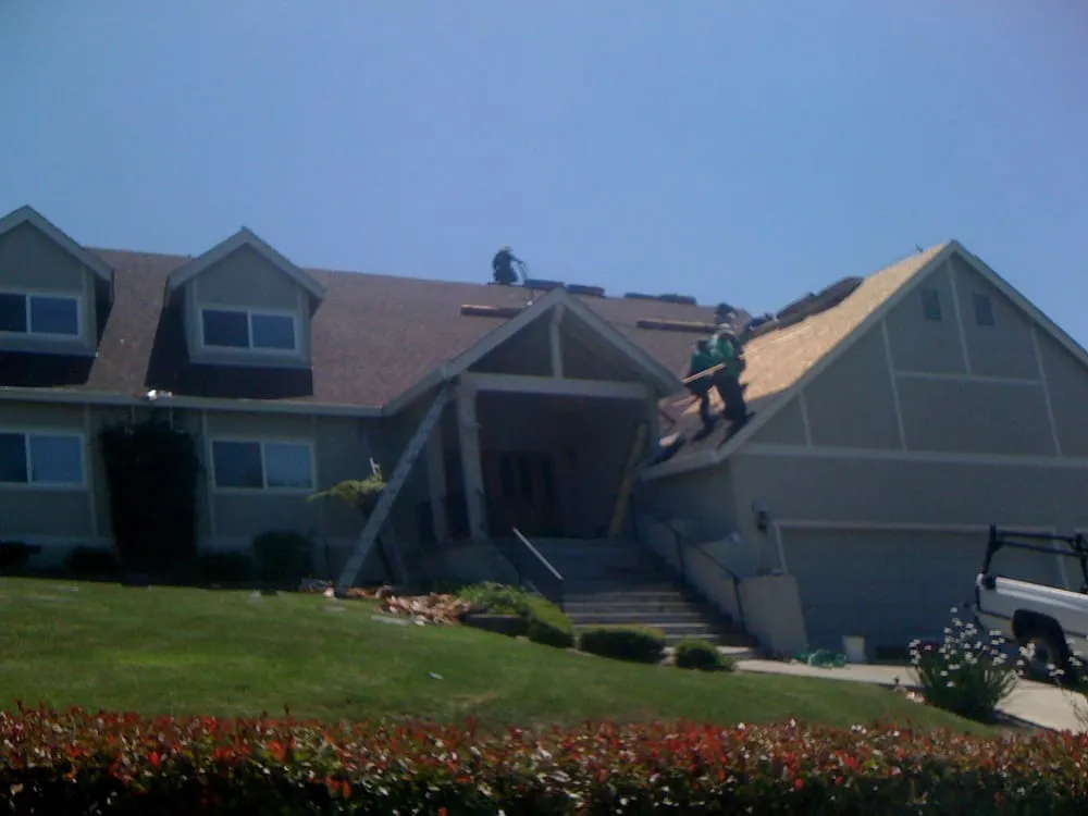 Slide of Arch Roofing