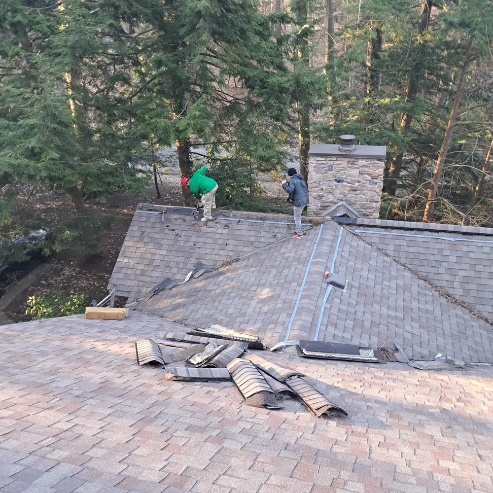 Licensed residential roofing service after storm damage across Grand Junction, MI - Archangel Construction