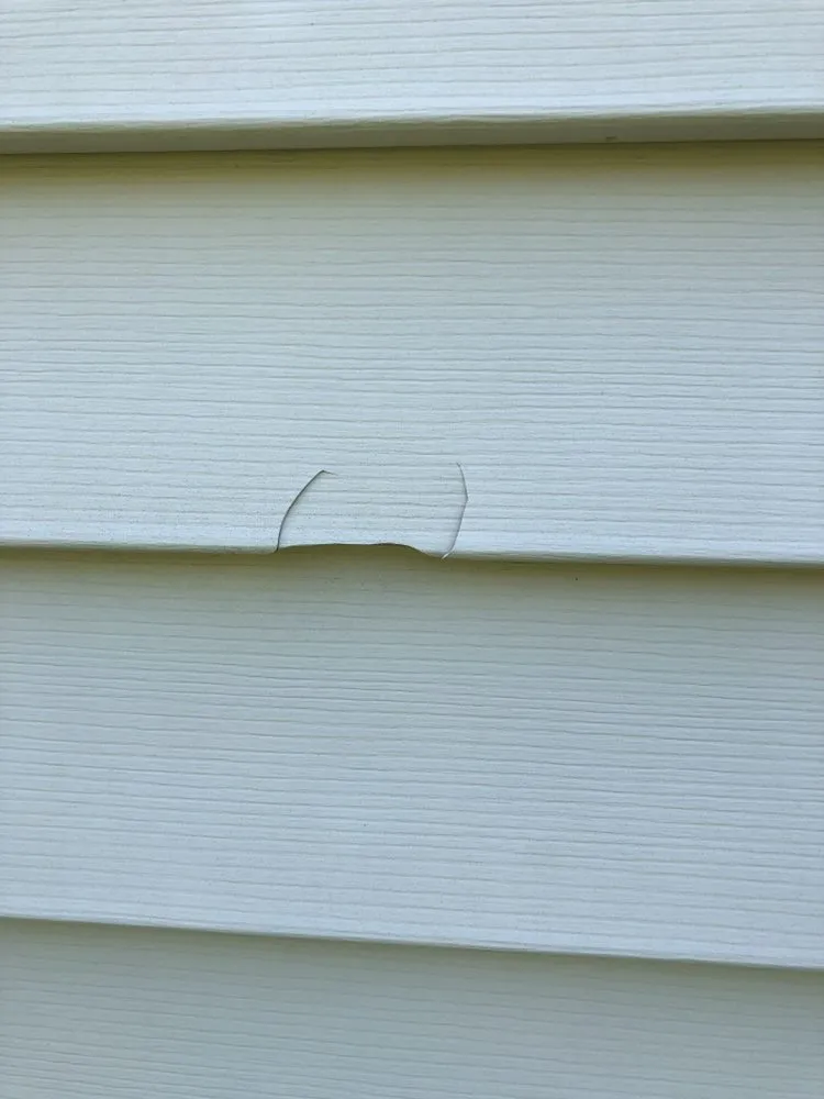 Emergency storm damage roof repair in South St. Paul, MN by Archcraft Exteriors