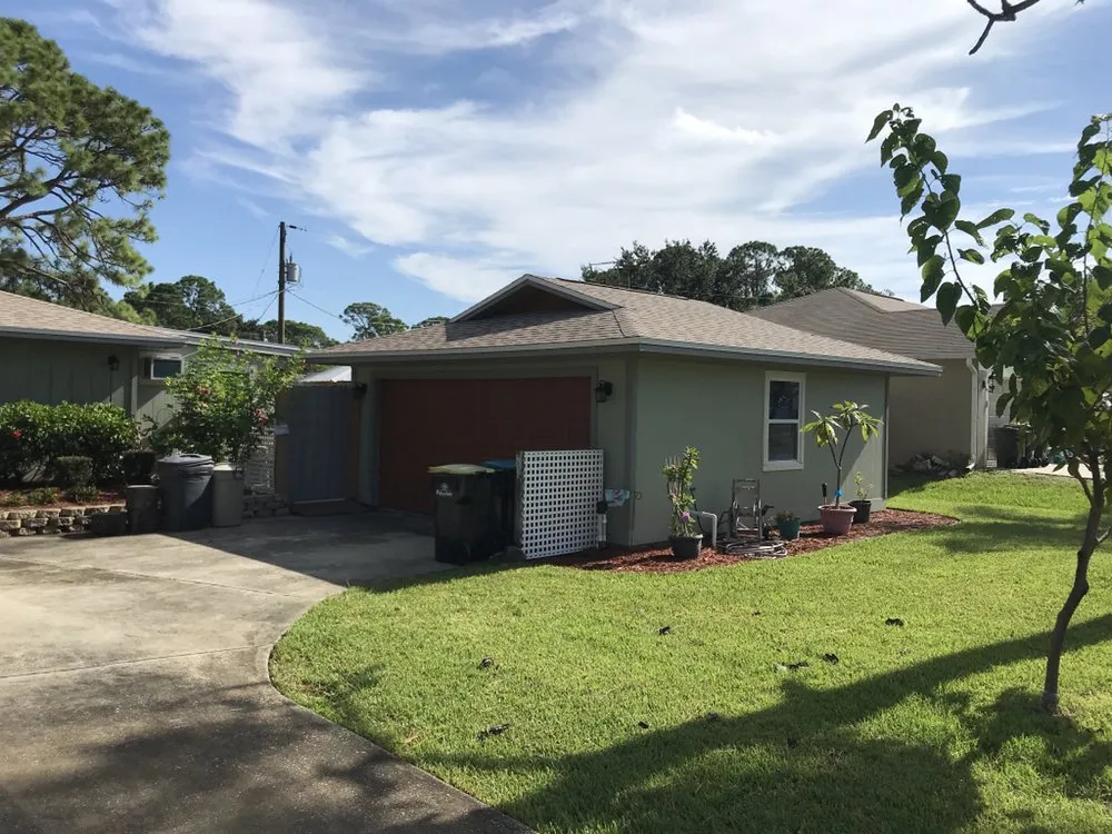 Slide of Archer Roofing Company