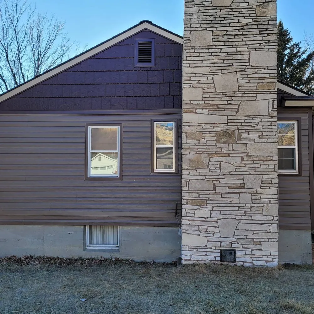 Slide of Archie's Home Improvements