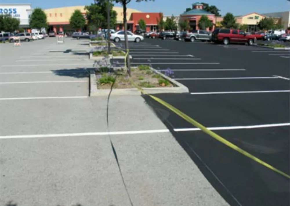 Slide of Archie's parking lot and maintenance