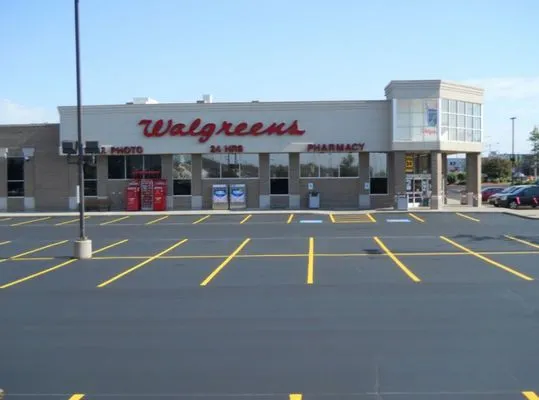 Archie's parking lot and maintenance Logo