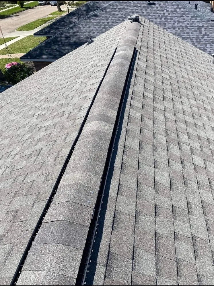 Slide of Archie's Roofing & Construction