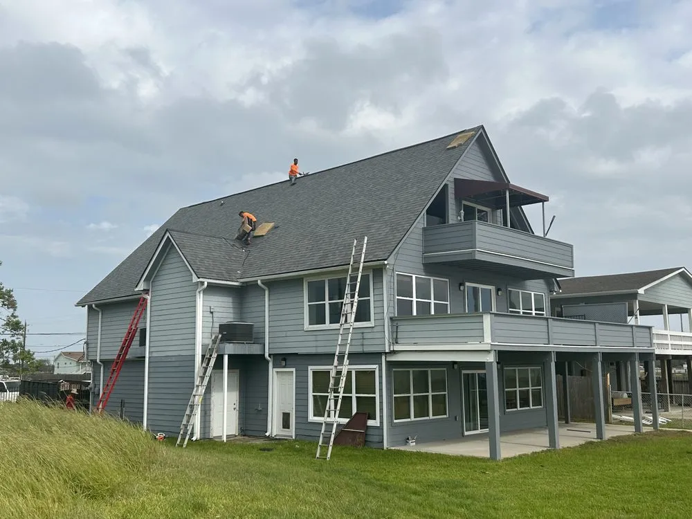 Slide of Archie's Roofing & Construction