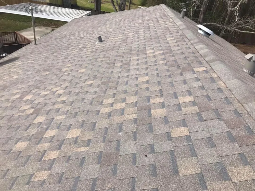 Slide of Arcon Roofing Construction