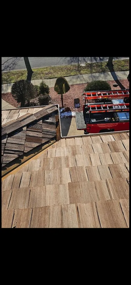 Slide of Arcos Roofing