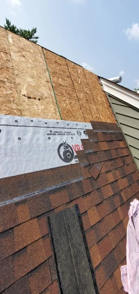 Slide of Arcos Roofing