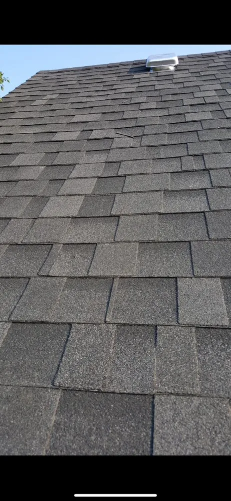 Slide of Arcos Roofing