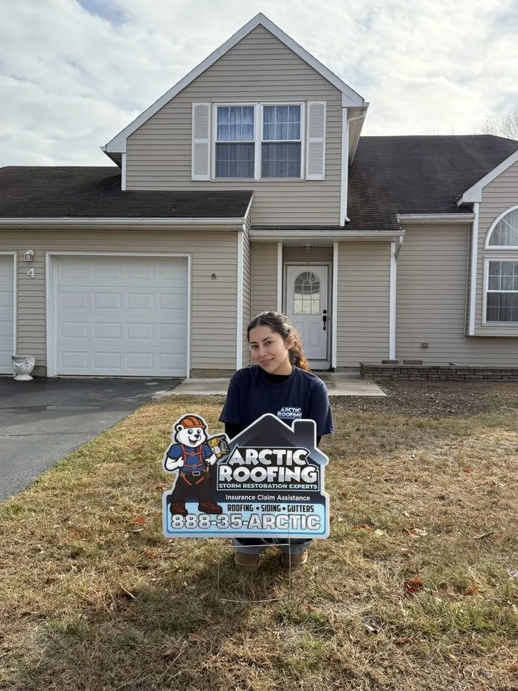 Slide of Arctic Roofing