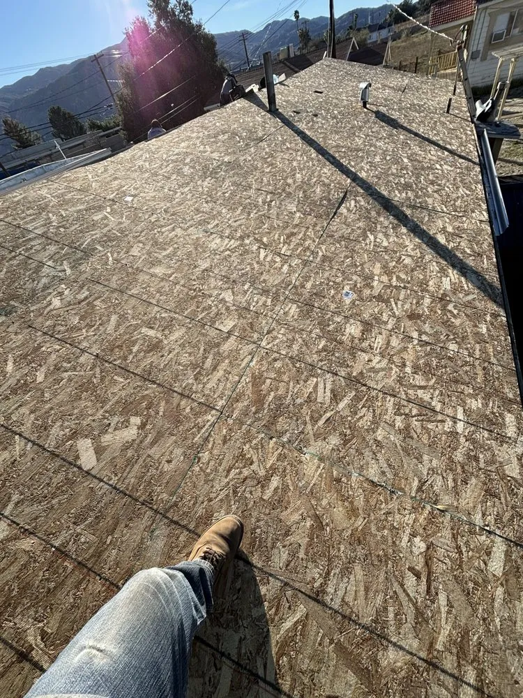 Slide of ARG Roofing Services