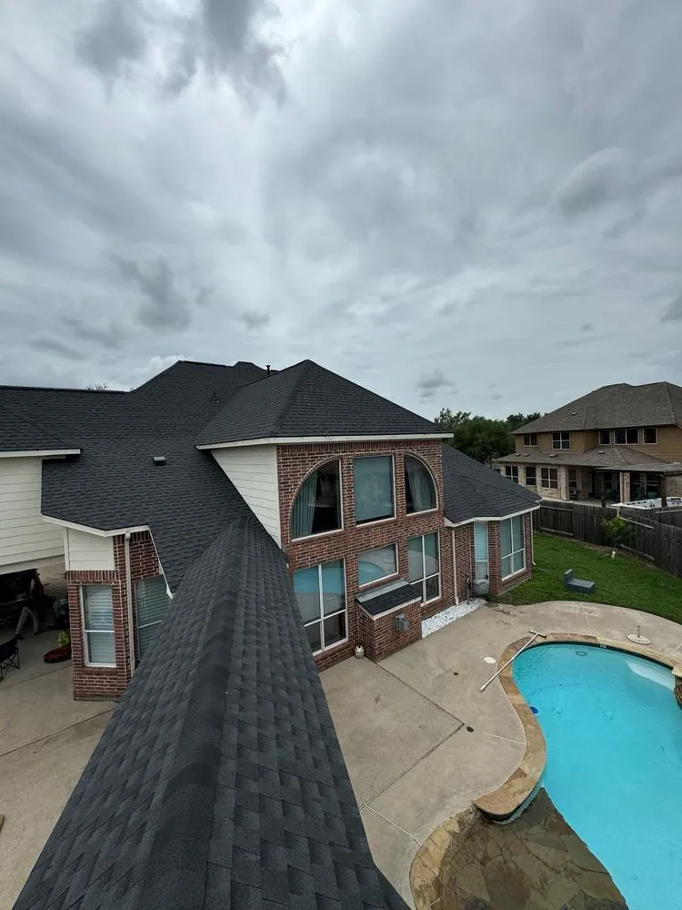 Slide of Argueta's Roofing Specialist