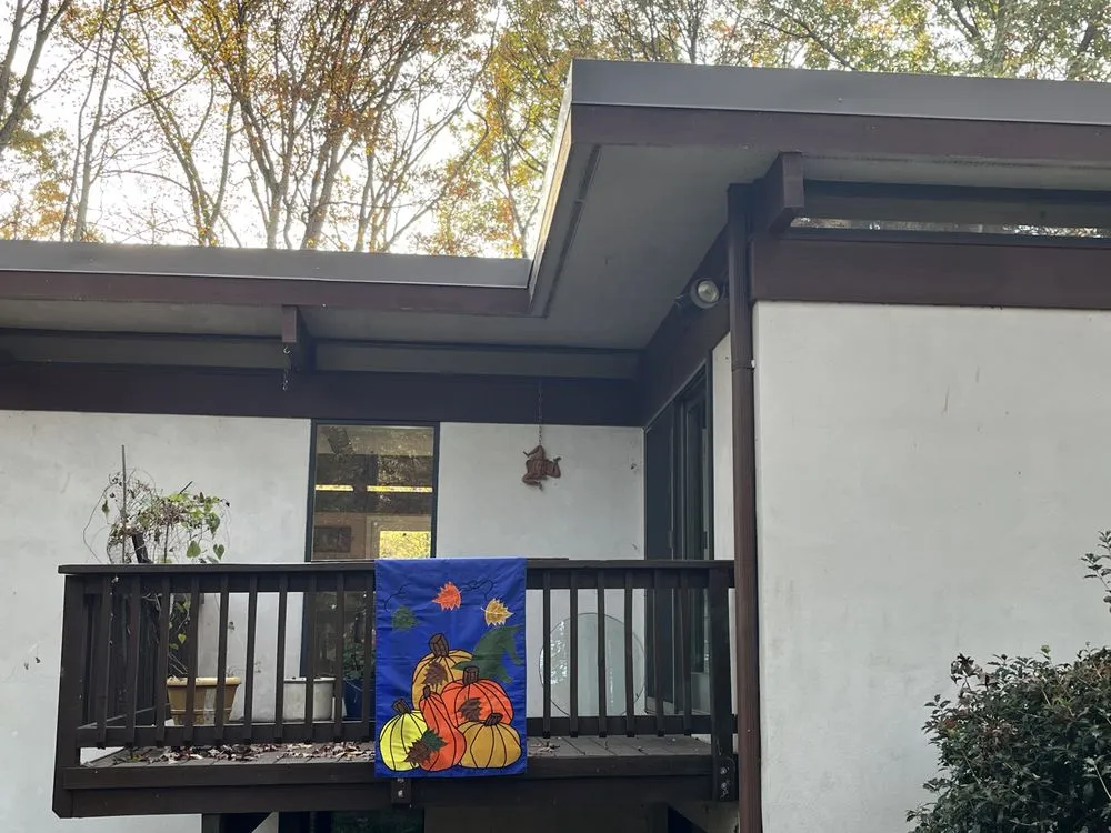 Slide of Argueta's Roofing Specialist